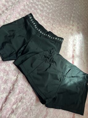2 pairs of spandex- one Under Armour Black